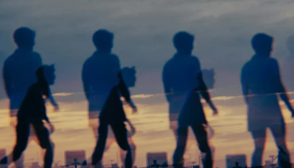 "Four men standing united as the time passes By - symbolizing unbreakable brotherhood."