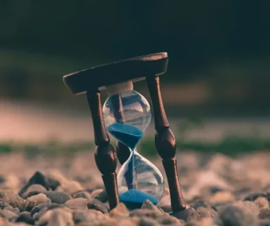 An hourglass displaying the time passing by