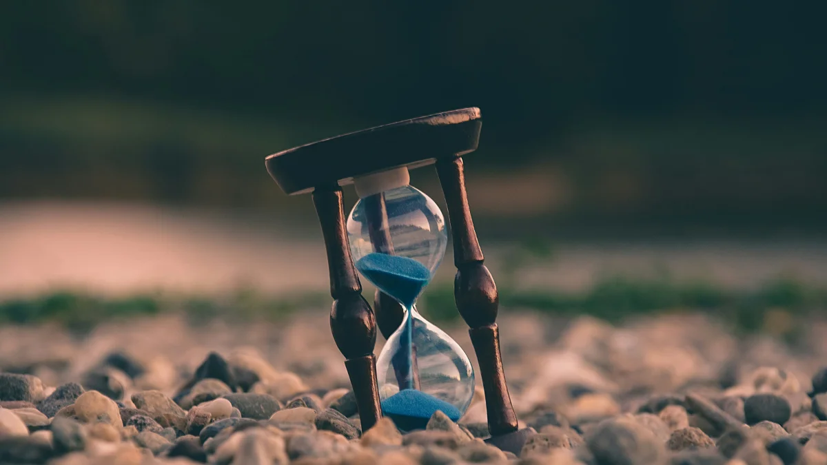 An hourglass displaying the time passing by