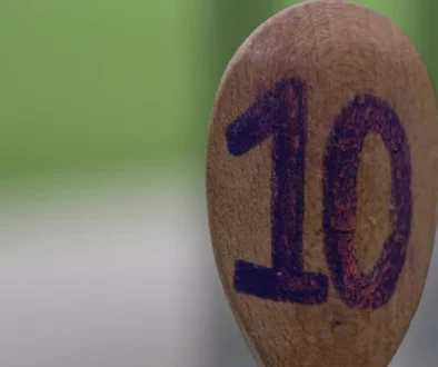 A wooden spoon with the number 10 written on it, symbolizing the 10-10-10 decision-making rule
