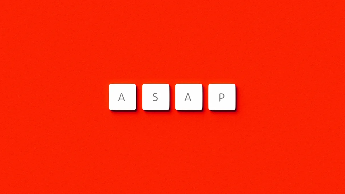 White keyboard keys spelling “ASAP” on a red background, symbolizing urgency and the essence of Parkinson’s Law: work expands to fill the time available.